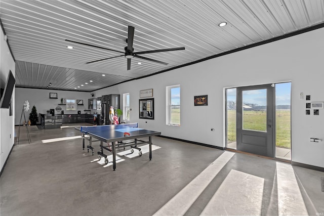 recreation room featuring concrete floors, ceiling fan, and wooden ceiling