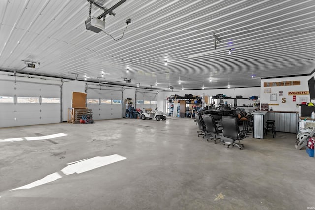 garage featuring a garage door opener