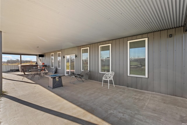 view of patio with a fire pit