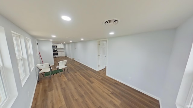 basement featuring hardwood / wood-style flooring