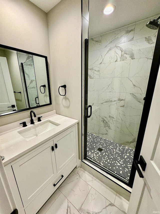 bathroom with vanity and walk in shower