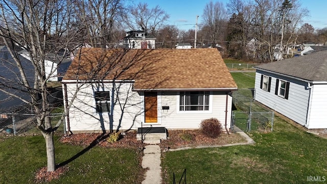 view of front of home with a front lawn