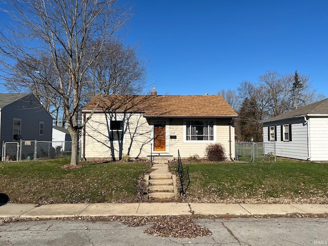 view of front of house with a front lawn