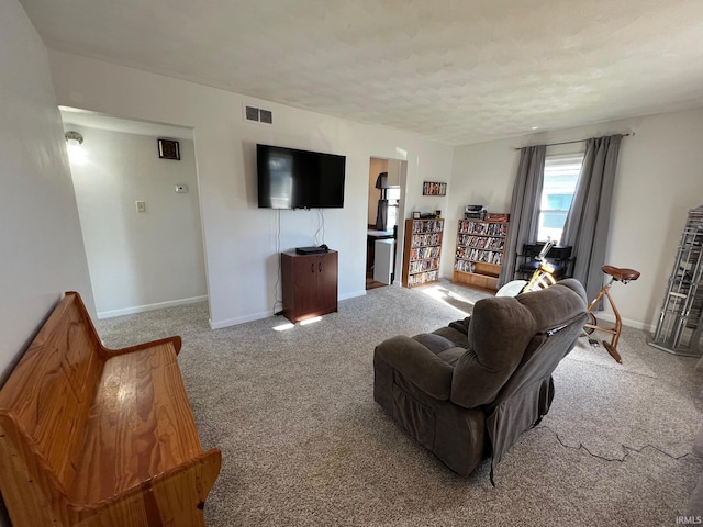 living room with light colored carpet