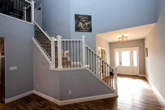 foyer with wood-type flooring