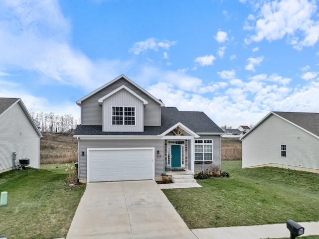 view of front of home with a garage and a front lawn