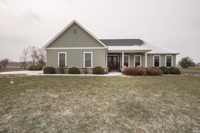 view of front of home with a front lawn and a porch