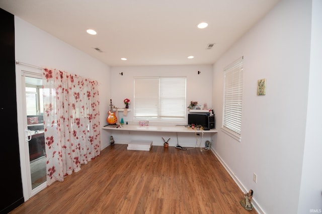 office with wood-type flooring