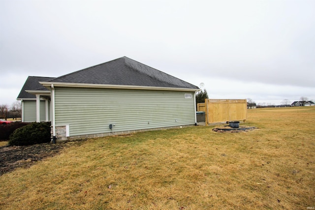 view of home's exterior featuring a yard