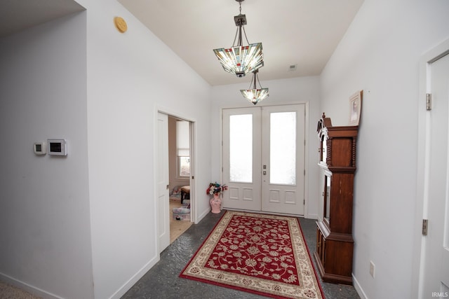 entryway featuring french doors