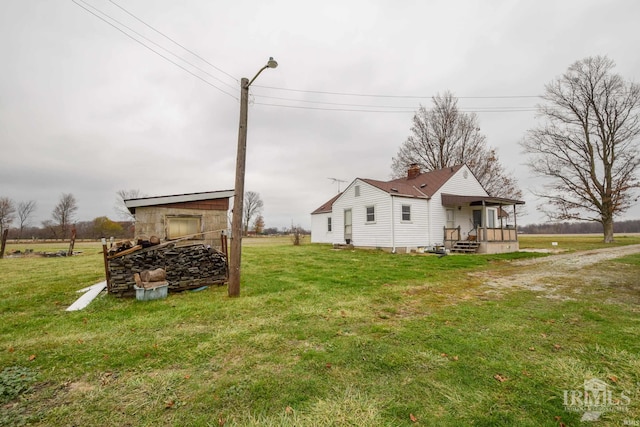 exterior space featuring an outbuilding and a porch