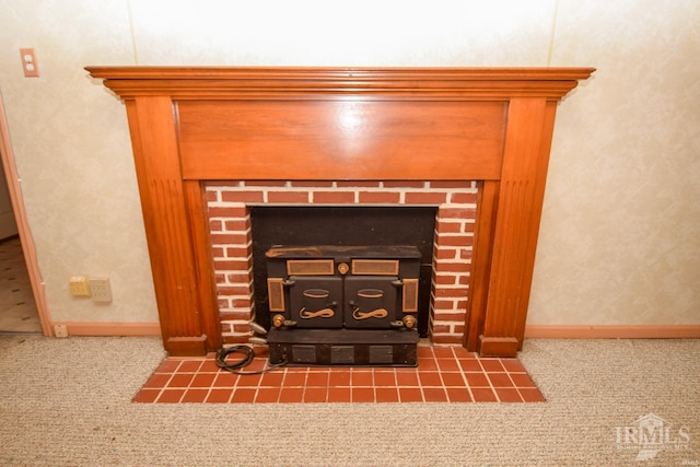 details with carpet flooring and a wood stove