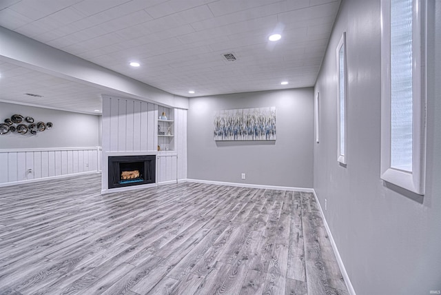 unfurnished living room with light wood-type flooring