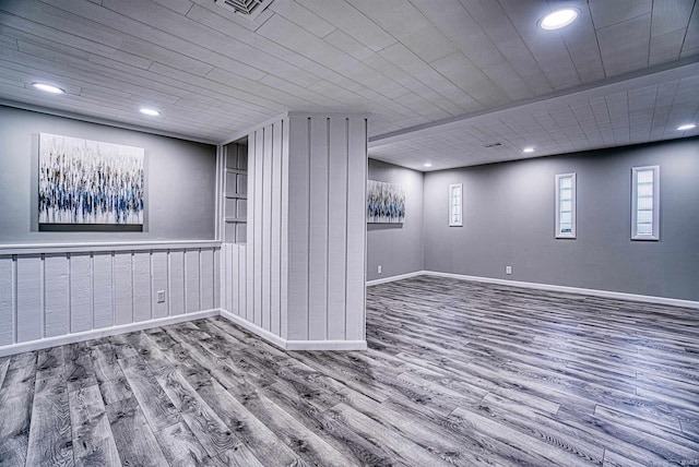 basement featuring hardwood / wood-style flooring