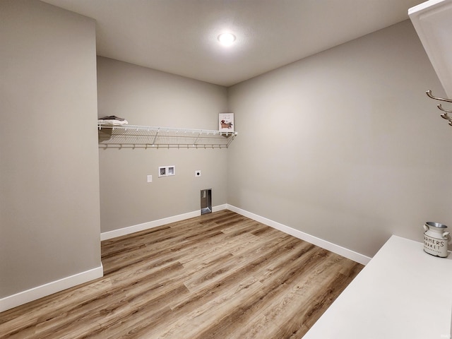 clothes washing area with hookup for an electric dryer, wood-type flooring, and hookup for a washing machine