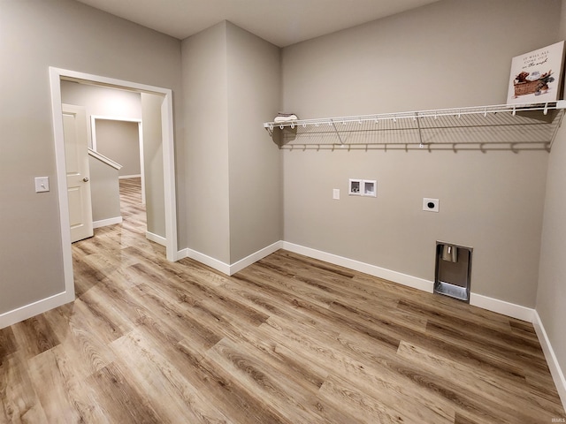 laundry room featuring hardwood / wood-style flooring, hookup for an electric dryer, and washer hookup