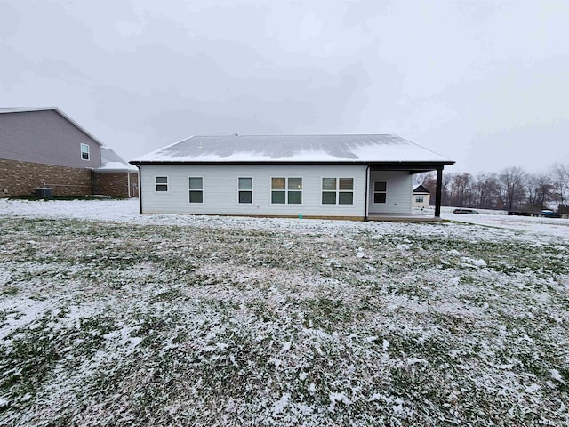 view of snow covered house