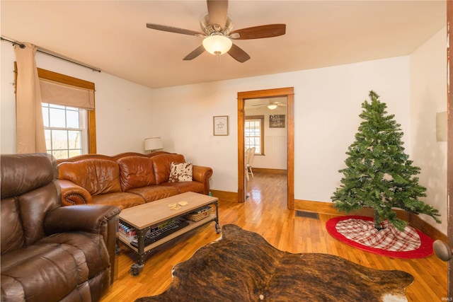 living room with light hardwood / wood-style flooring