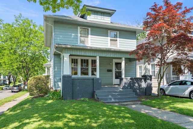 view of front of home featuring a front lawn