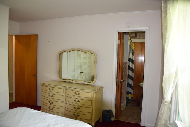 bedroom with crown molding