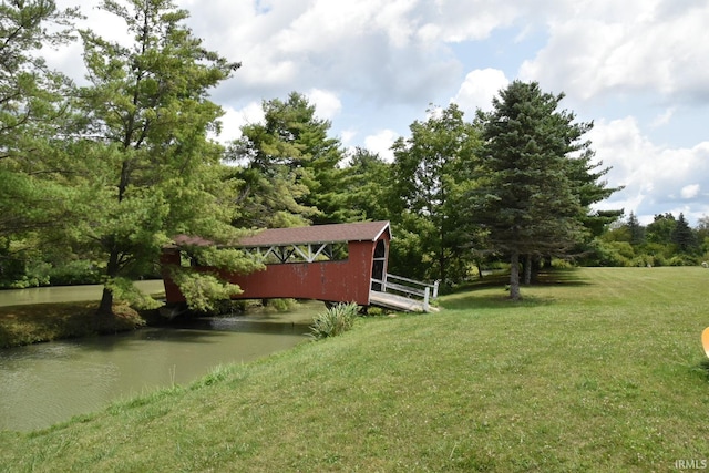 view of yard with a water view