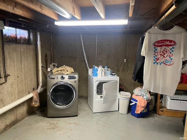 laundry room with washing machine and dryer