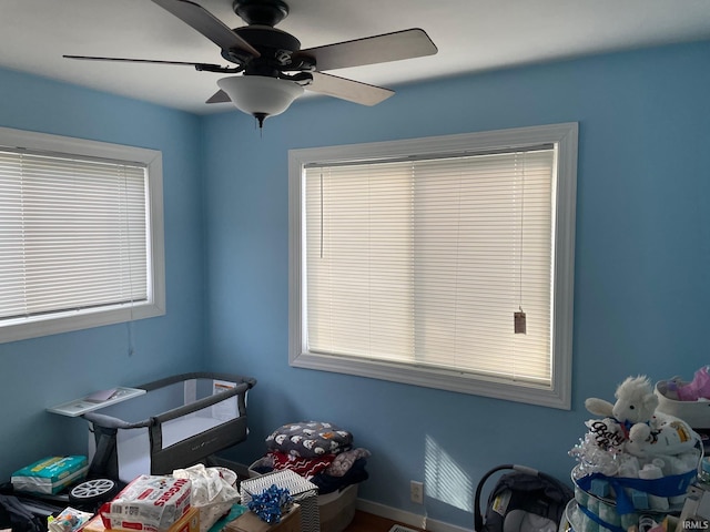 bedroom featuring ceiling fan