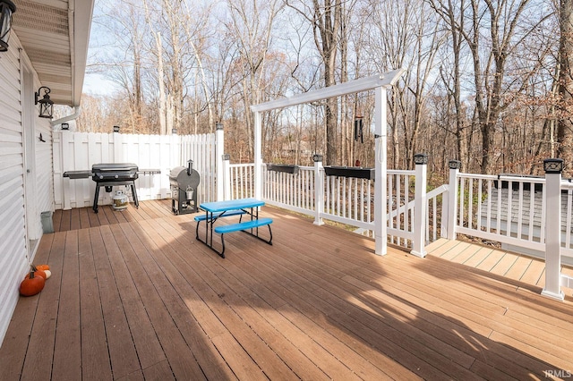 deck featuring a grill