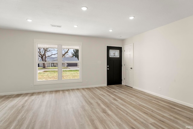 entrance foyer featuring light hardwood / wood-style floors