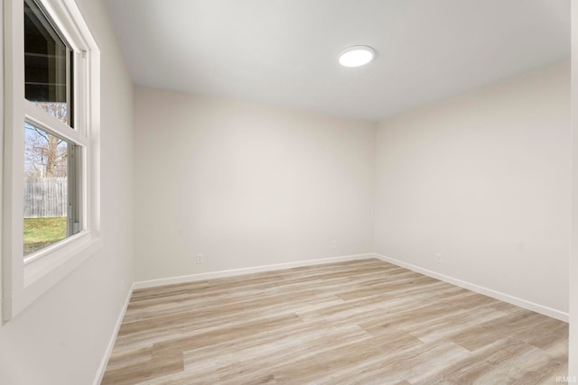 unfurnished room featuring light hardwood / wood-style floors