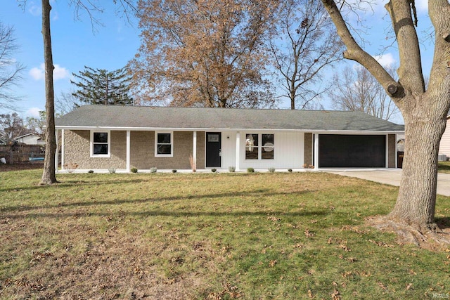 single story home with a front yard and a garage