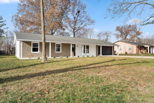 ranch-style house with a front lawn and a garage