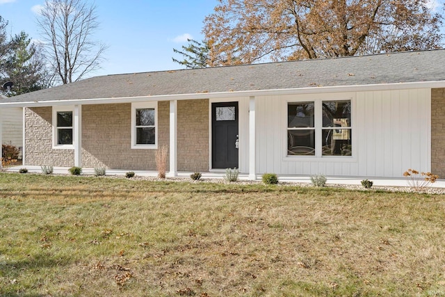 ranch-style home with a front yard