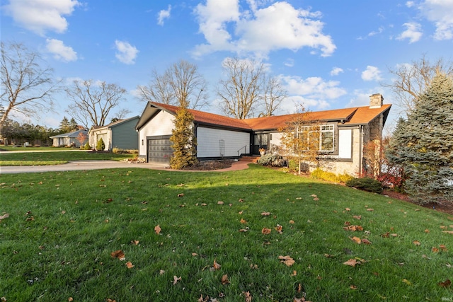 single story home with a garage and a front yard