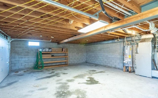 basement featuring heating unit and gas water heater