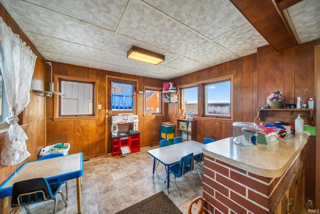 interior space featuring wooden walls