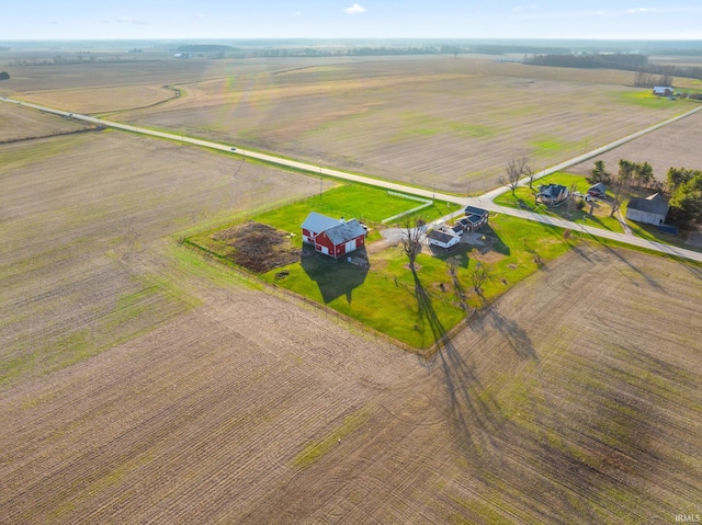 birds eye view of property featuring a rural view