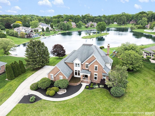 birds eye view of property featuring a water view