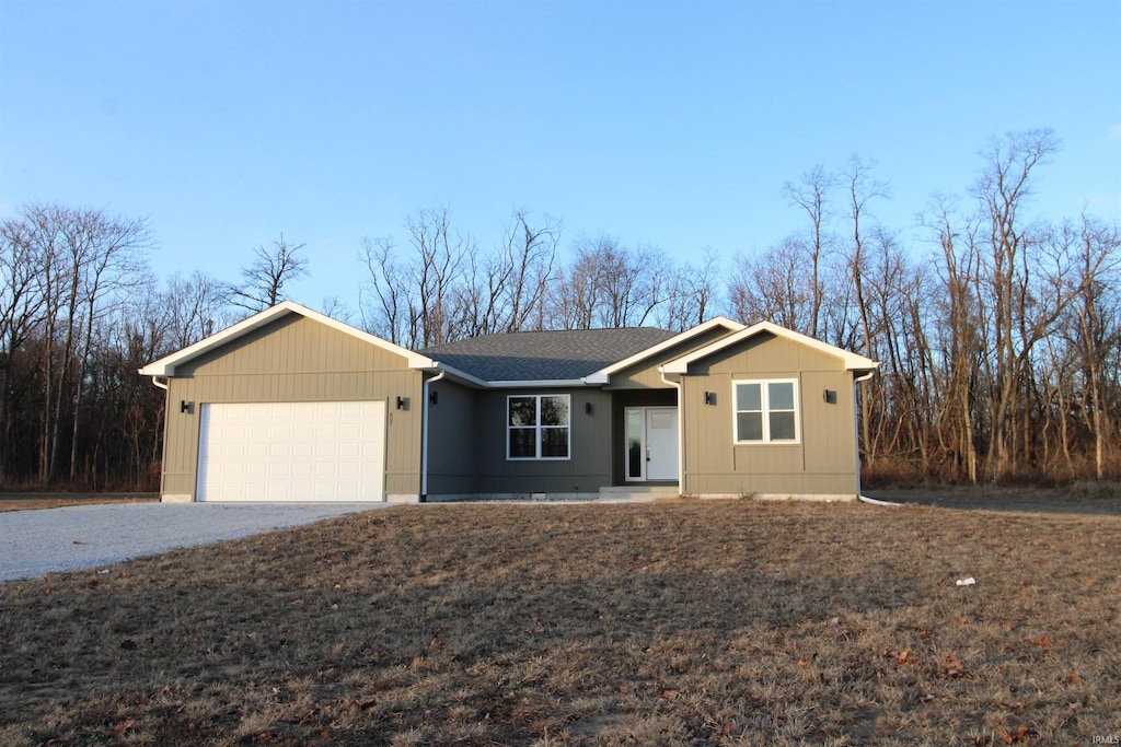 single story home with a garage