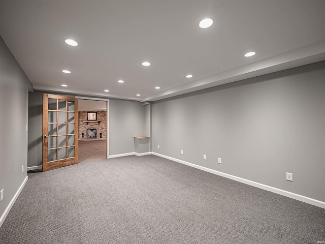 basement with carpet flooring