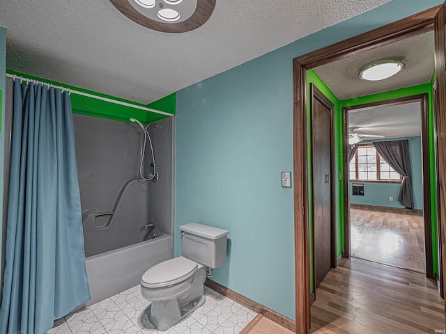 bathroom with ceiling fan, wood-type flooring, a textured ceiling, toilet, and shower / tub combo with curtain