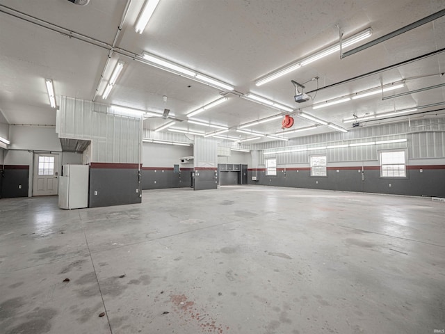 garage with white refrigerator