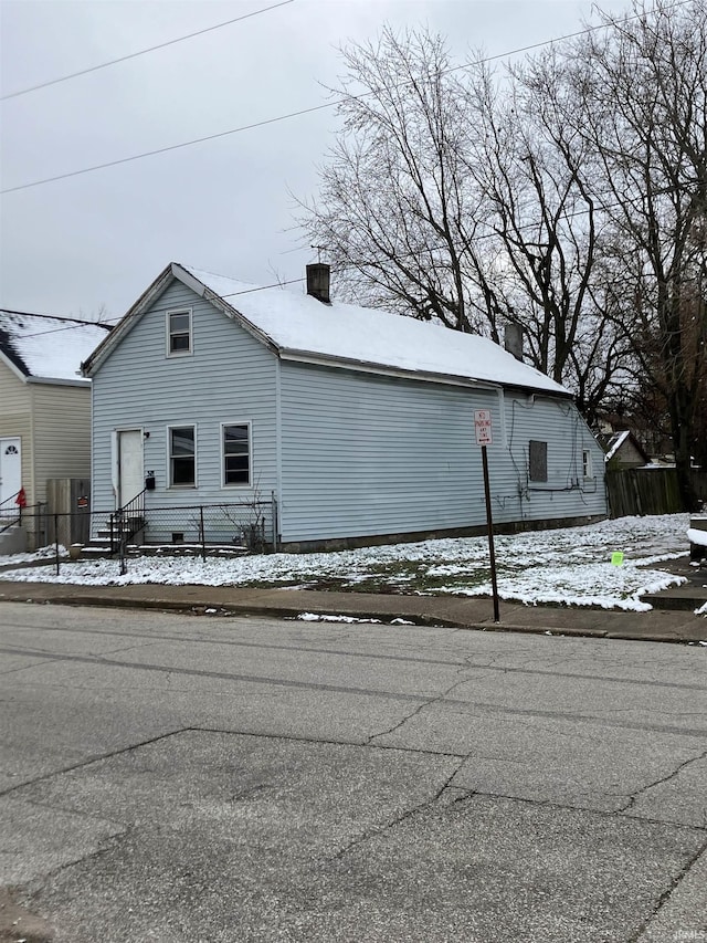 view of snow covered property