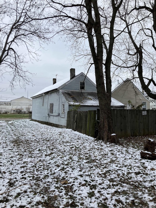 view of snow covered house