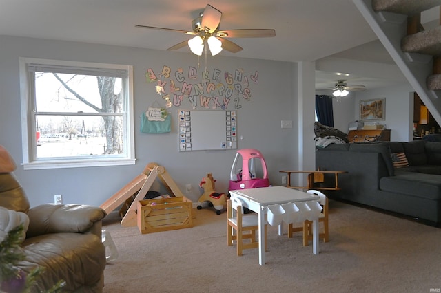 game room featuring carpet flooring and ceiling fan