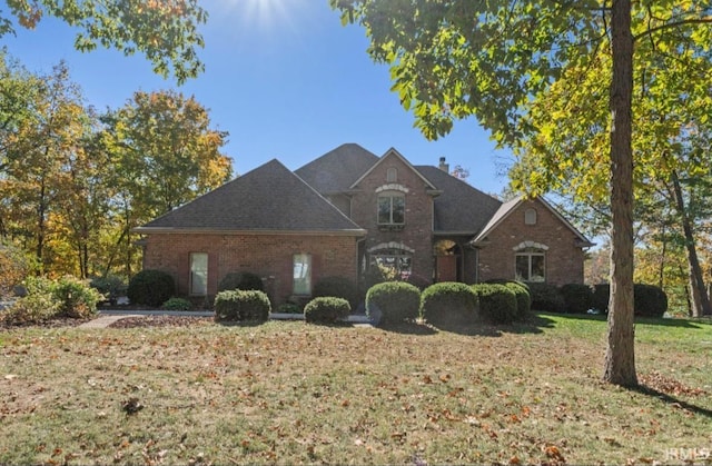 view of property featuring a front yard