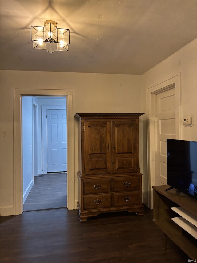 interior space with dark hardwood / wood-style flooring