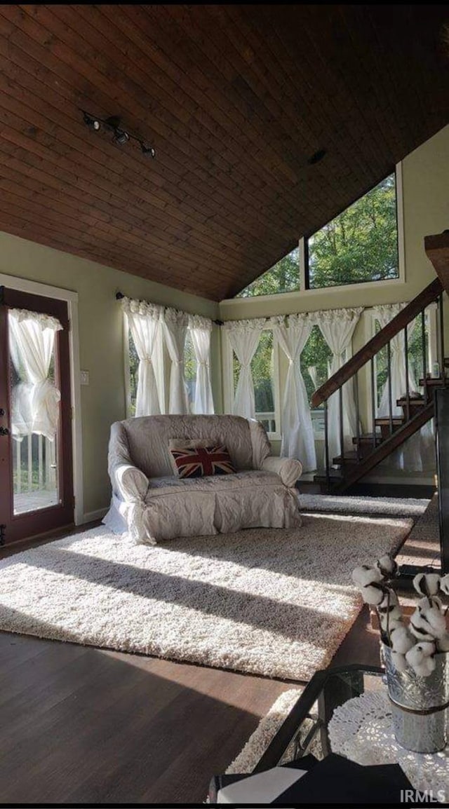 interior space with vaulted ceiling and wood ceiling