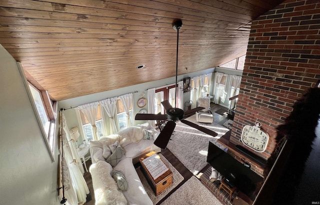 unfurnished living room featuring vaulted ceiling and wood ceiling