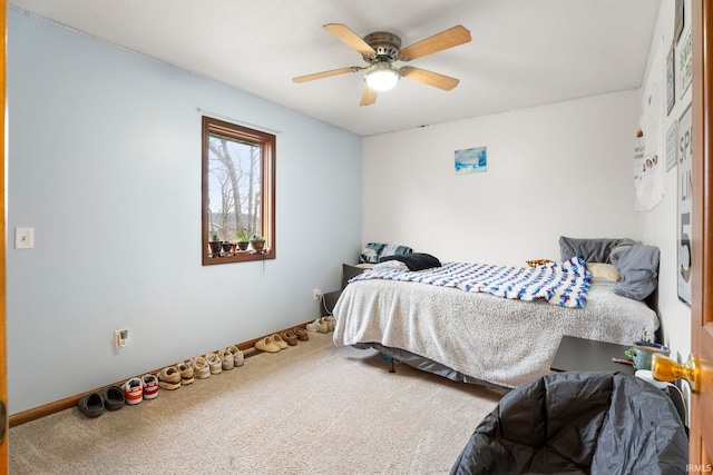 bedroom featuring carpet and ceiling fan